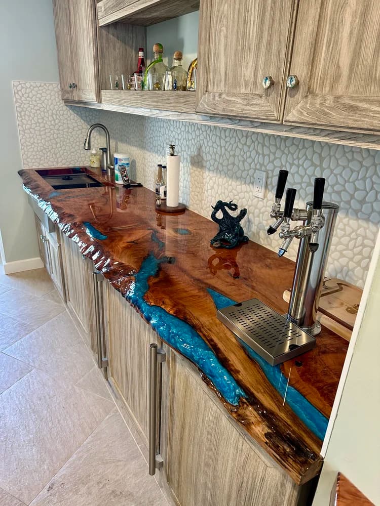 Blue epoxy river bar top with chrome draft taps