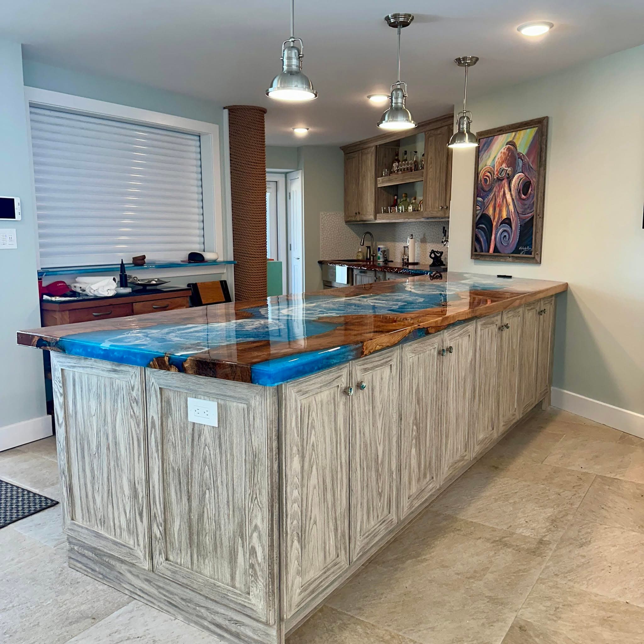 Kitchen island with ocean blue epoxy river top
