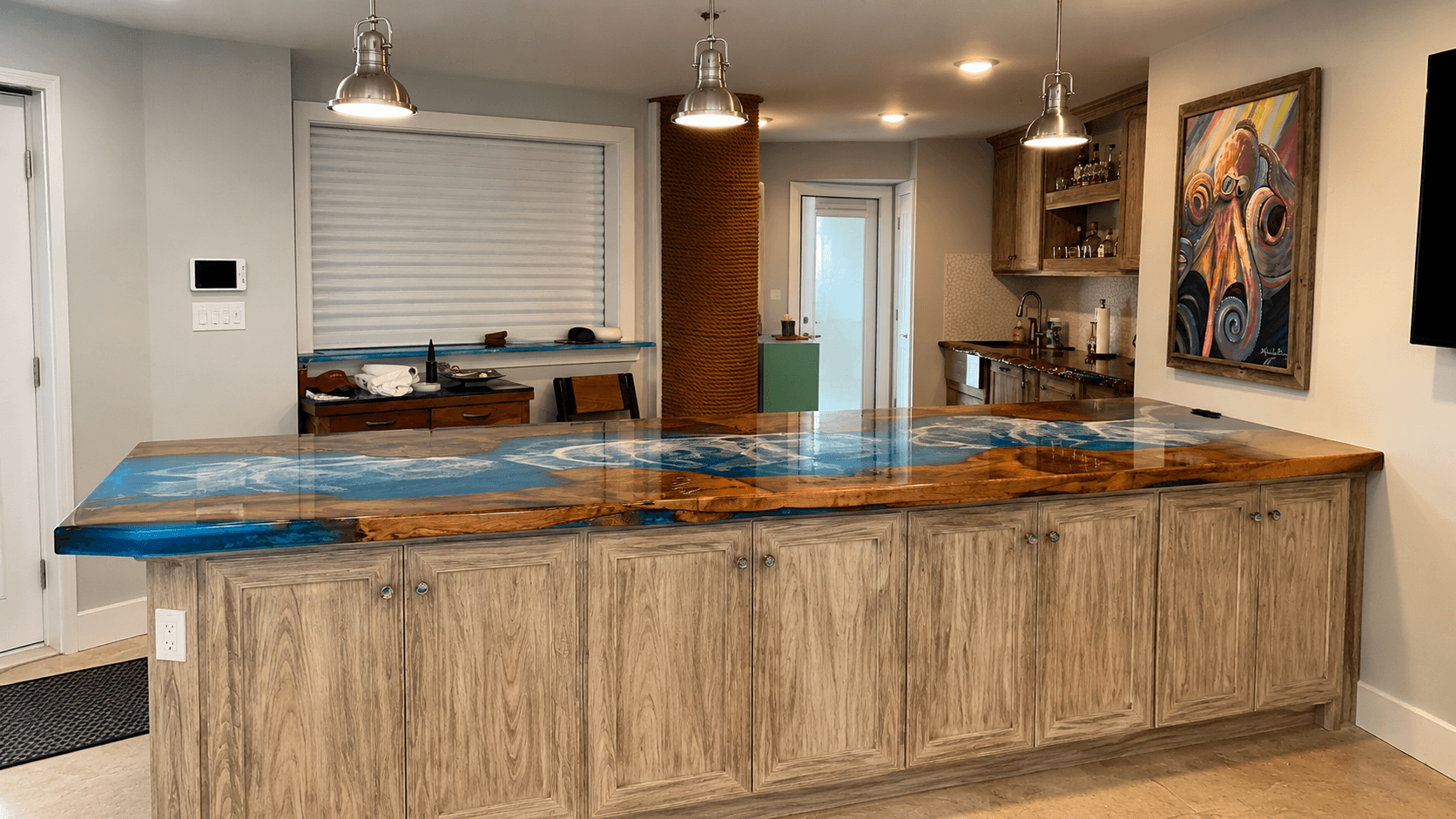 Kitchen island with an ocean blue epoxy river top
