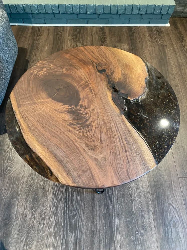 Round walnut slab table with coffee bean epoxy inlay