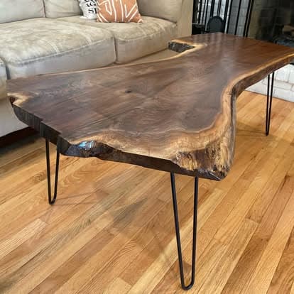 Organic shaped walnut slab coffee table with hairpin legs